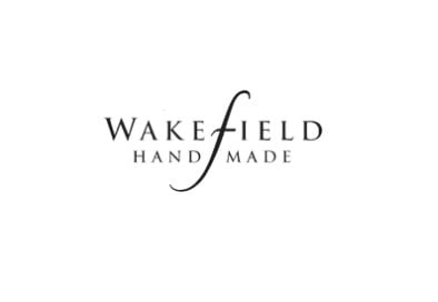Text logo reads "WAKEFIELD HANDMADE" with a large stylized letter "f" extending through the center. White background.