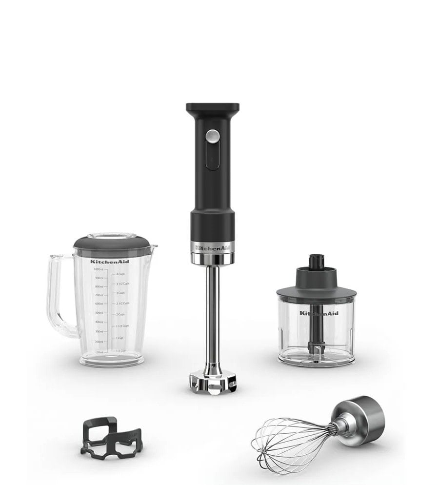 KitchenAid hand blender set including a motor body, blending arm, beaker with lid, mini chopper, whisk attachment, and pan guard.